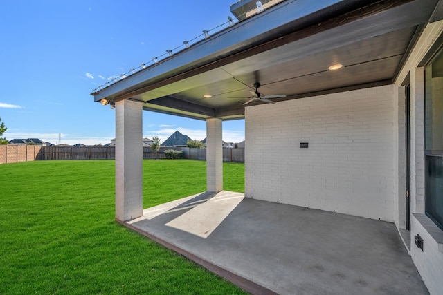 view of patio / terrace featuring ceiling fan