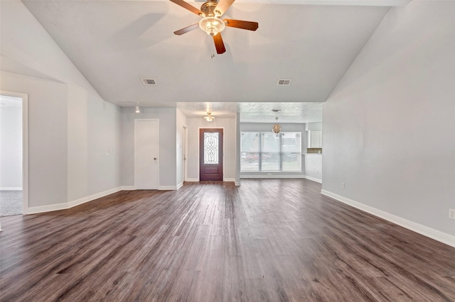 unfurnished living room with ceiling fan, lofted ceiling, and dark hardwood / wood-style flooring