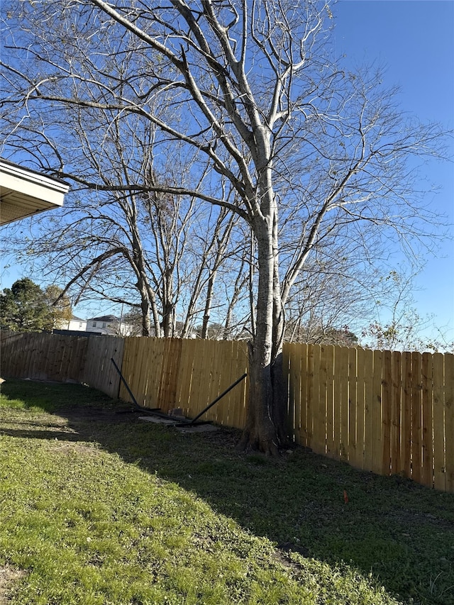 view of yard with fence