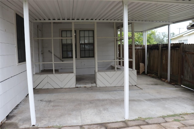 view of patio / terrace featuring a carport