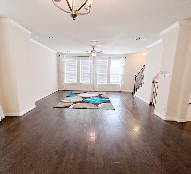 interior space with ceiling fan, dark hardwood / wood-style flooring, and ornamental molding