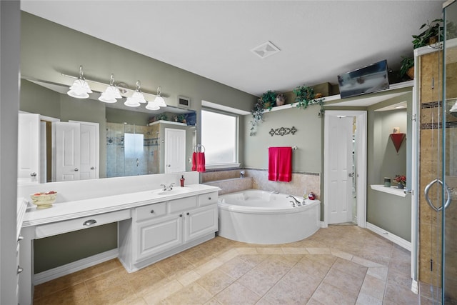 bathroom with tile patterned flooring, vanity, and independent shower and bath