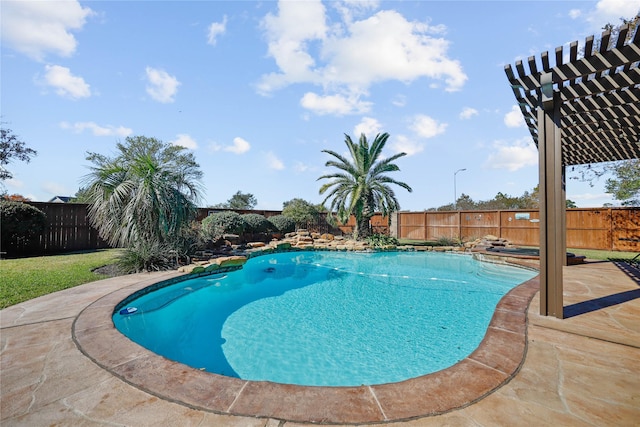 view of swimming pool with a patio area