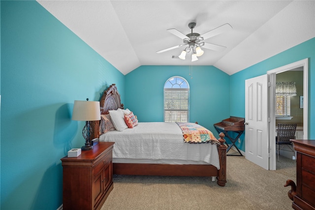 bedroom with light carpet, ceiling fan, and lofted ceiling