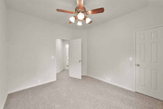 spare room with light carpet and ceiling fan