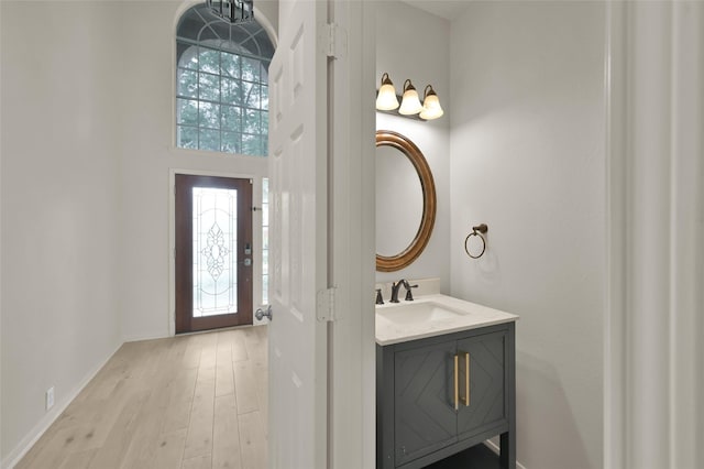 bathroom featuring vanity and hardwood / wood-style floors