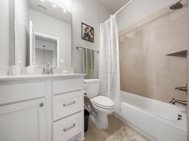 full bathroom featuring shower / bath combination with curtain, vanity, and toilet