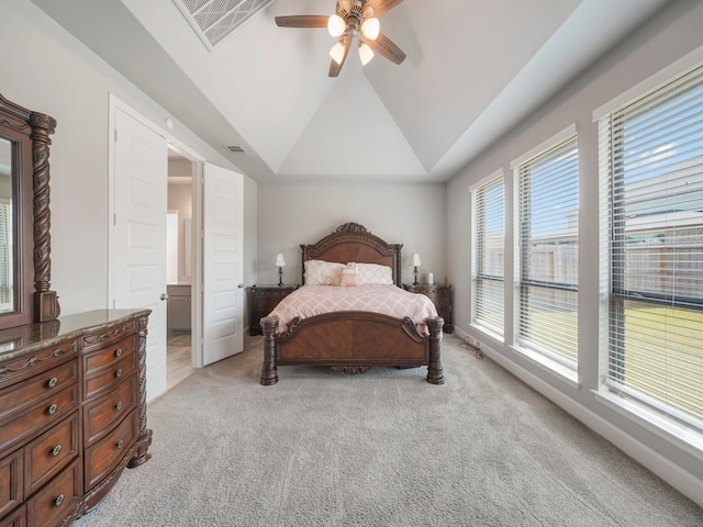 carpeted bedroom featuring ceiling fan and lofted ceiling