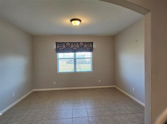 view of tiled spare room