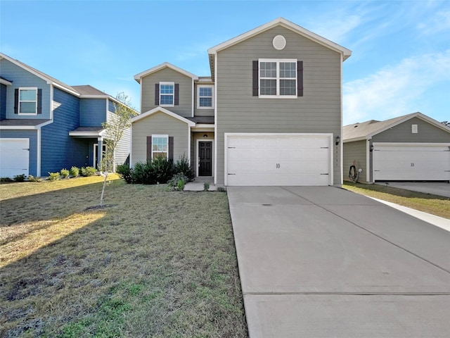 front facade featuring a garage and a front lawn