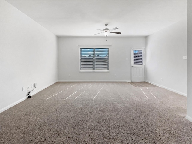 empty room with light carpet and ceiling fan