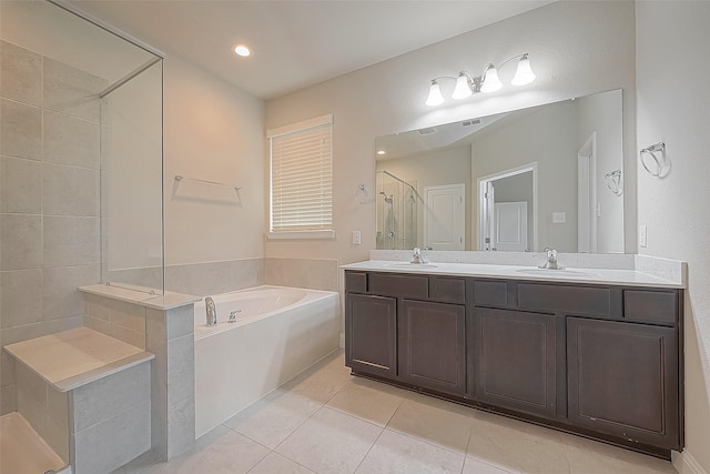 bathroom featuring vanity, tile patterned floors, and independent shower and bath