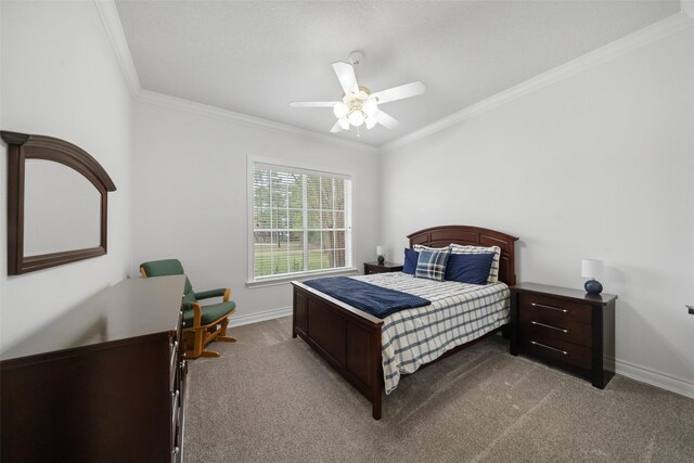 carpeted bedroom featuring crown molding and ceiling fan