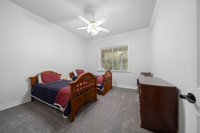 bedroom featuring ceiling fan, crown molding, and light carpet