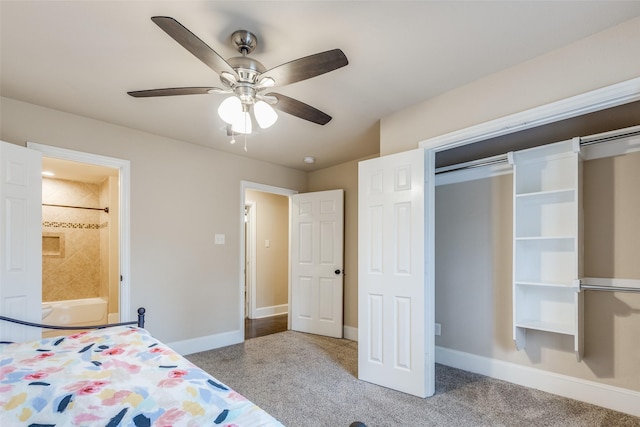 unfurnished bedroom with light carpet, ceiling fan, and ensuite bath