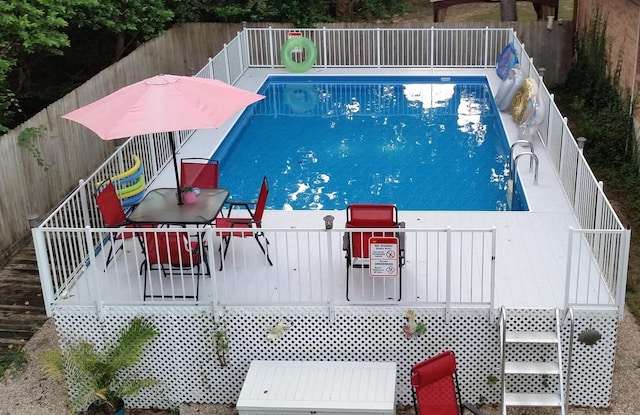 view of pool with a deck