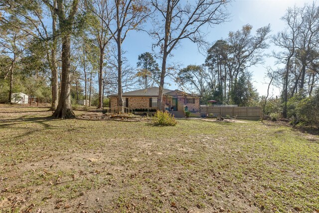 view of yard featuring a deck