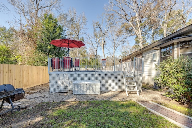 view of yard featuring a wooden deck