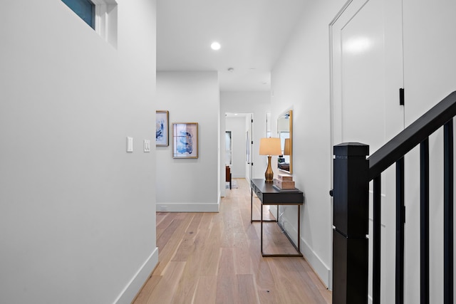 hall with light wood-type flooring