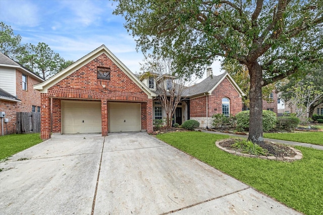 view of front property with a front yard and a garage