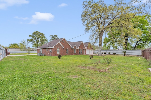 view of yard featuring a garage