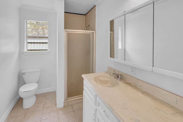 bathroom featuring tile patterned flooring, toilet, a shower with door, and crown molding