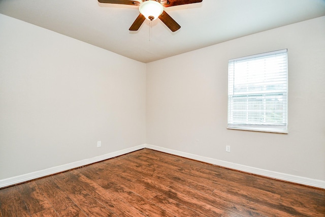 empty room featuring hardwood / wood-style flooring and ceiling fan