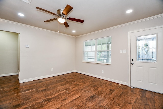 foyer featuring dark hardwood / wood-style floors, ceiling fan, and ornamental molding