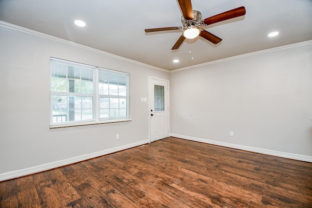 unfurnished room featuring ceiling fan, dark hardwood / wood-style floors, and ornamental molding