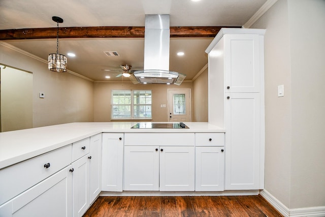 kitchen featuring dark wood-type flooring, white cabinetry, black electric cooktop, island range hood, and kitchen peninsula