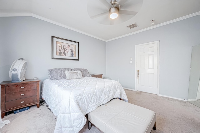 carpeted bedroom featuring ceiling fan, crown molding, and vaulted ceiling