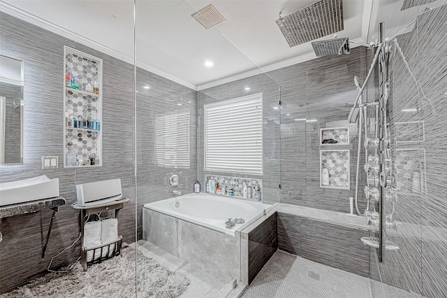 bathroom featuring vanity, plus walk in shower, and tile walls