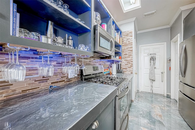 kitchen featuring decorative backsplash, appliances with stainless steel finishes, and crown molding