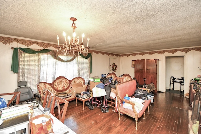 dining space featuring a chandelier, a textured ceiling, and dark hardwood / wood-style flooring