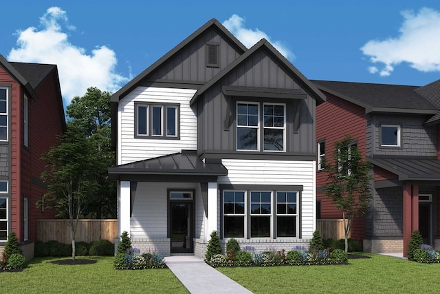 view of front facade with a standing seam roof, fence, a front lawn, and board and batten siding