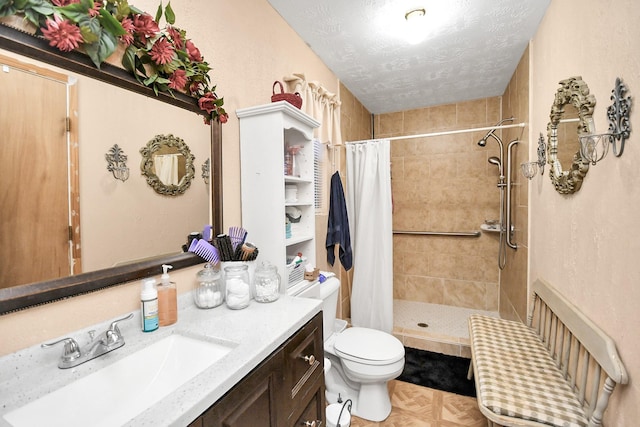 bathroom with vanity, a shower with curtain, a textured ceiling, and toilet