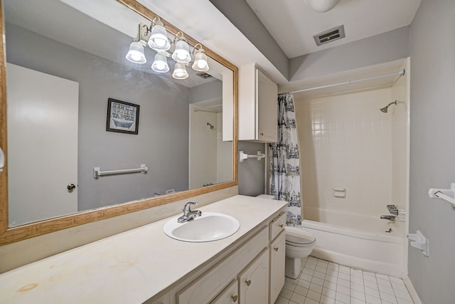 full bathroom with tile patterned floors, vanity, toilet, and shower / bath combo with shower curtain