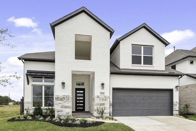 view of front of home with a garage