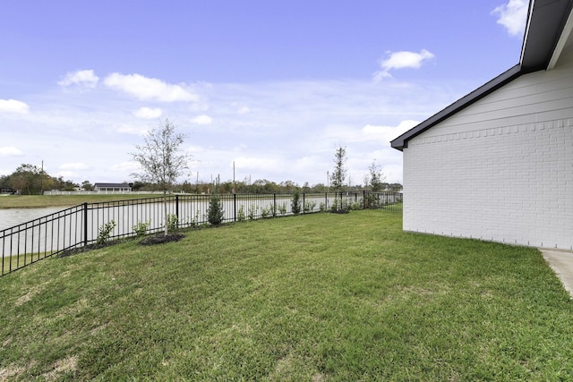 view of yard featuring a water view