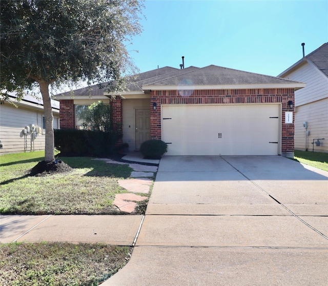 ranch-style house with a garage and a front lawn