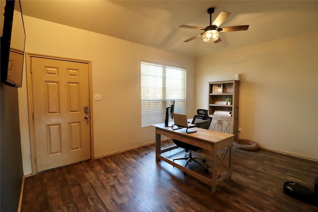 home office with ceiling fan and dark hardwood / wood-style flooring