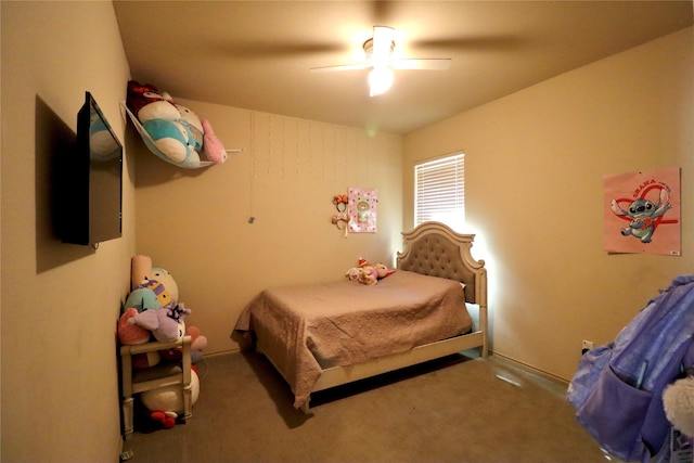 bedroom with ceiling fan and carpet floors