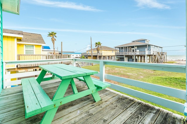 deck featuring a water view