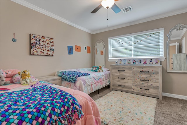 carpeted bedroom featuring ceiling fan and ornamental molding