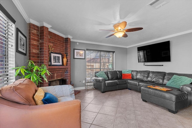 living room with ornamental molding, a fireplace, and light tile patterned floors