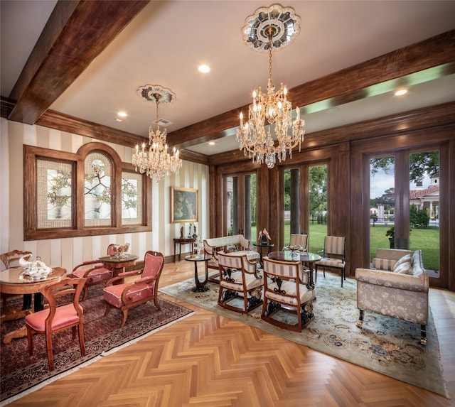 dining space with plenty of natural light, light parquet flooring, and a notable chandelier