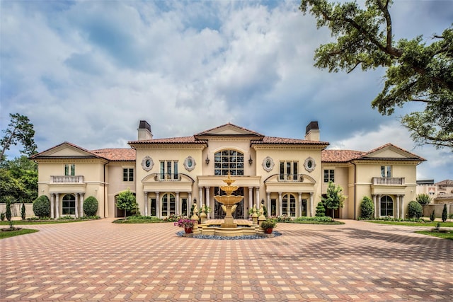 view of front of property with a balcony