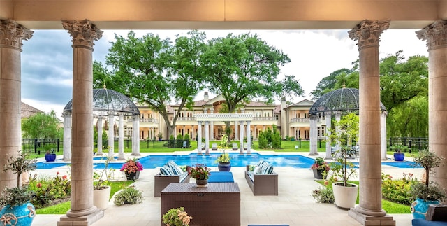 view of swimming pool with a pergola