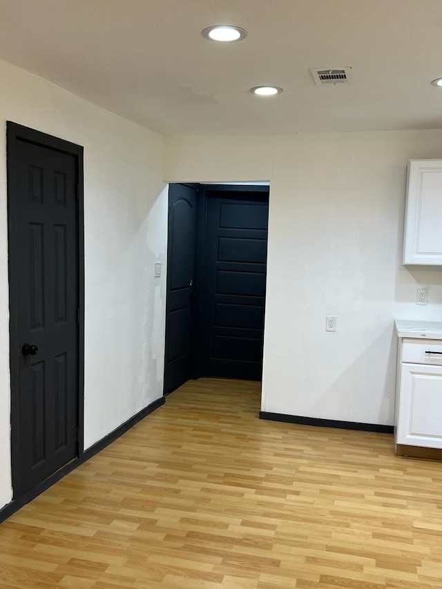 interior space with light hardwood / wood-style floors