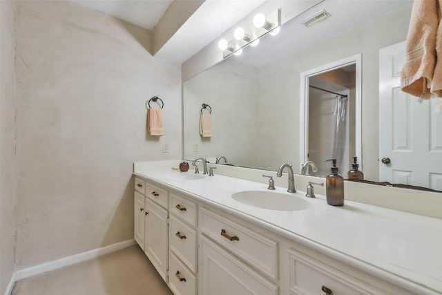 bathroom featuring vanity